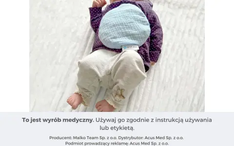 Ciepły termofor z pestek wiśni dla noworodka, delikatnie ogrzewający brzuszek.