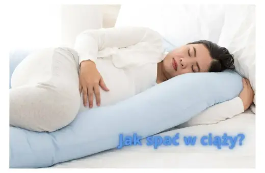 Kobieta w ciąży śpi na boku, podpierając brzuch poduszką. Dowiedz się, jak spać w ciąży, by czuć się komfortowo.